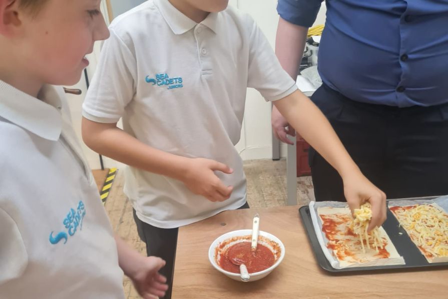 Juniors making pizzas - fun and food!